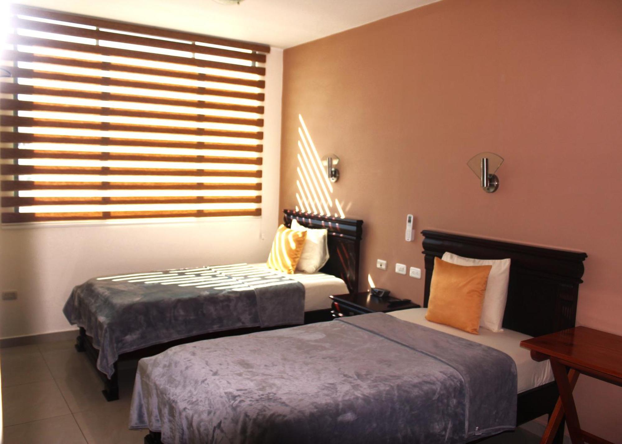 Hotel Flamingo ปูแอร์โตอาโยรา ภายนอก รูปภาพ
